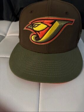 Olive and Brown Embroidered Bird Logo cooperstown collection hat